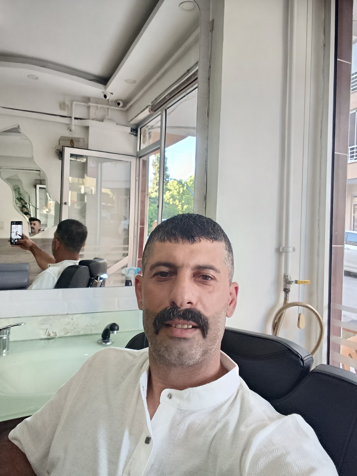 Berber Cenk — salondan bir kare